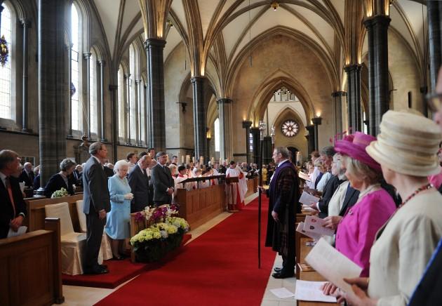 Queen Elizabeth II, accompanied by The Duke of Edinburgh, arrive for the rededication of the newly refurbished Temple Church Organ during Choral Evensong at Temple Church, London.
Picture date: Tuesday May 7, 2013.