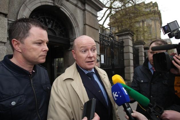 (Left - right) Oliver and Austin Stack, sons of Brian Stack, the only prison officer to be assassinated in the Republic, after they met Sinn Fein president Gerry Adams at Leinster House, Dublin.
Picture date: Thursday May 9, 2013