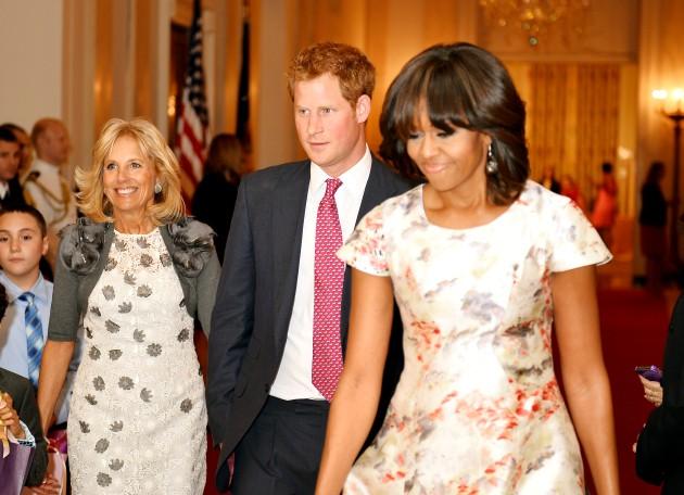 Prince Harry with the First Lady Michelle Obama and Jill Biden (left) during a visit to the White House.
Picture date: Thursday May 9, 2013.