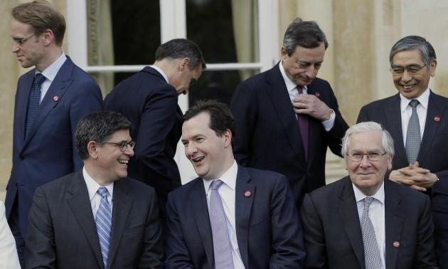 (Front row, left - right) Lew Jacob, U.S. Treasury Secretary,George Osborne Britain's Chancellor of the Exchequer, and Mervyn King, Governor of the Bank of England, as they take part in the family photo for the G7 finance ministers and central bank govern