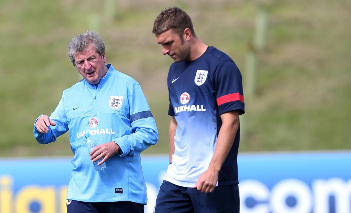 Roy Hodgson has a few words for Rickie Lambert in England training