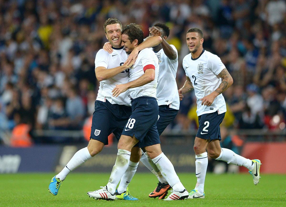 Rickie Lambert gets a hug from Frank Lampard as he celebrates his goal