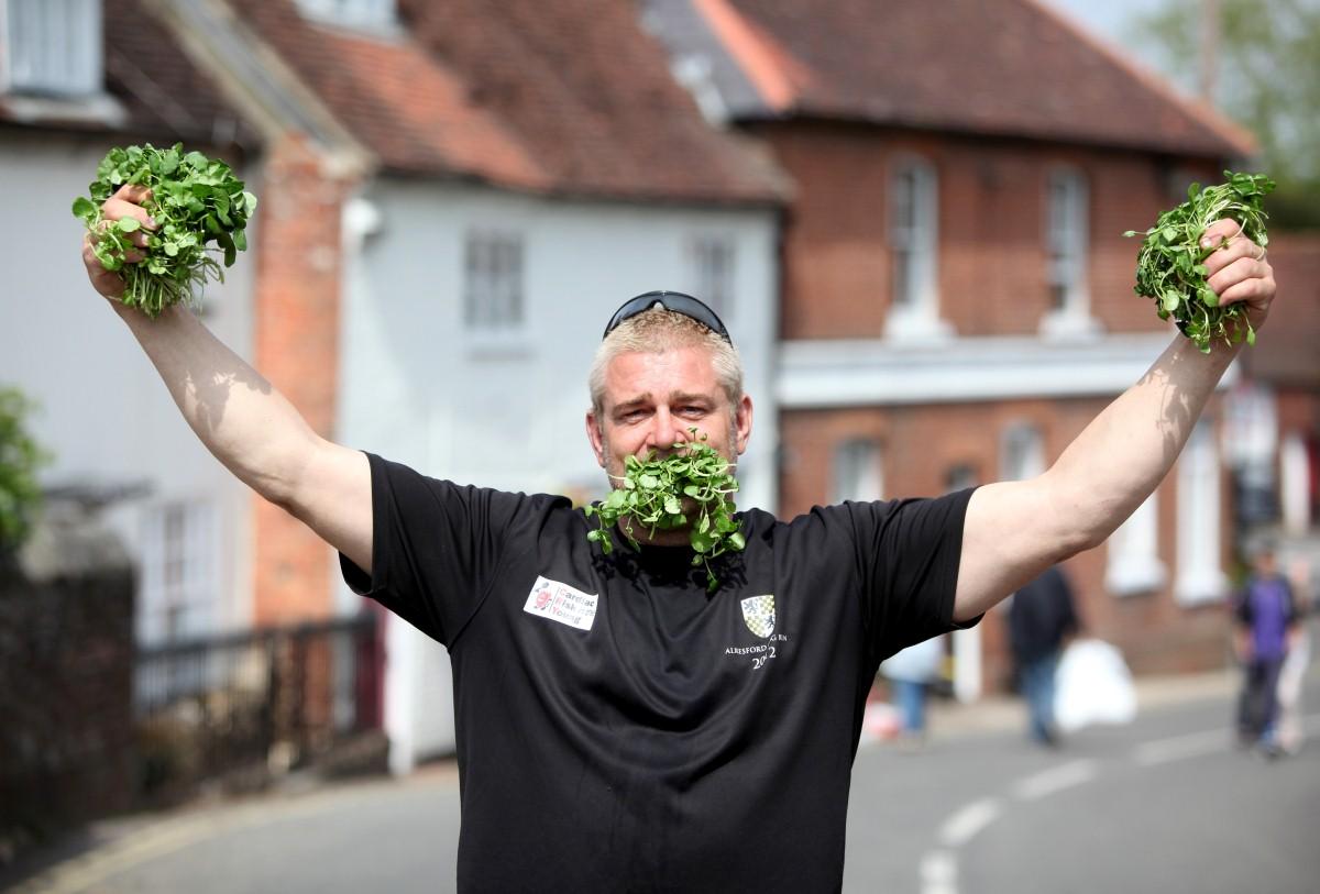 The Year in Pictures - 2013 - Glenn Walsh broke the world record for eating 2 bags of watercress at Alresford Watercress Festival, he consumed them in 35 seconds. May 20, 2013.