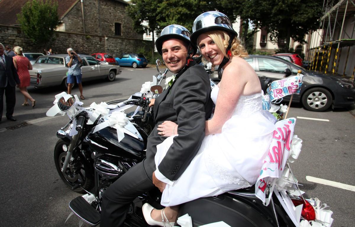 The Year in Pictures - 2013 - Jason Young and Kelly Blackman had a biker wedding in Southampton. August 3, 2013.
