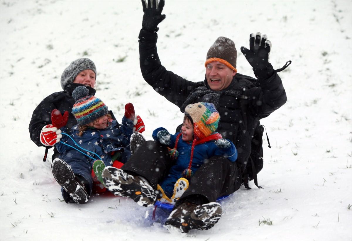 The Year in Pictures - 2013 - Families enjoyed the snow at Orams Arbour. January 18, 2013.