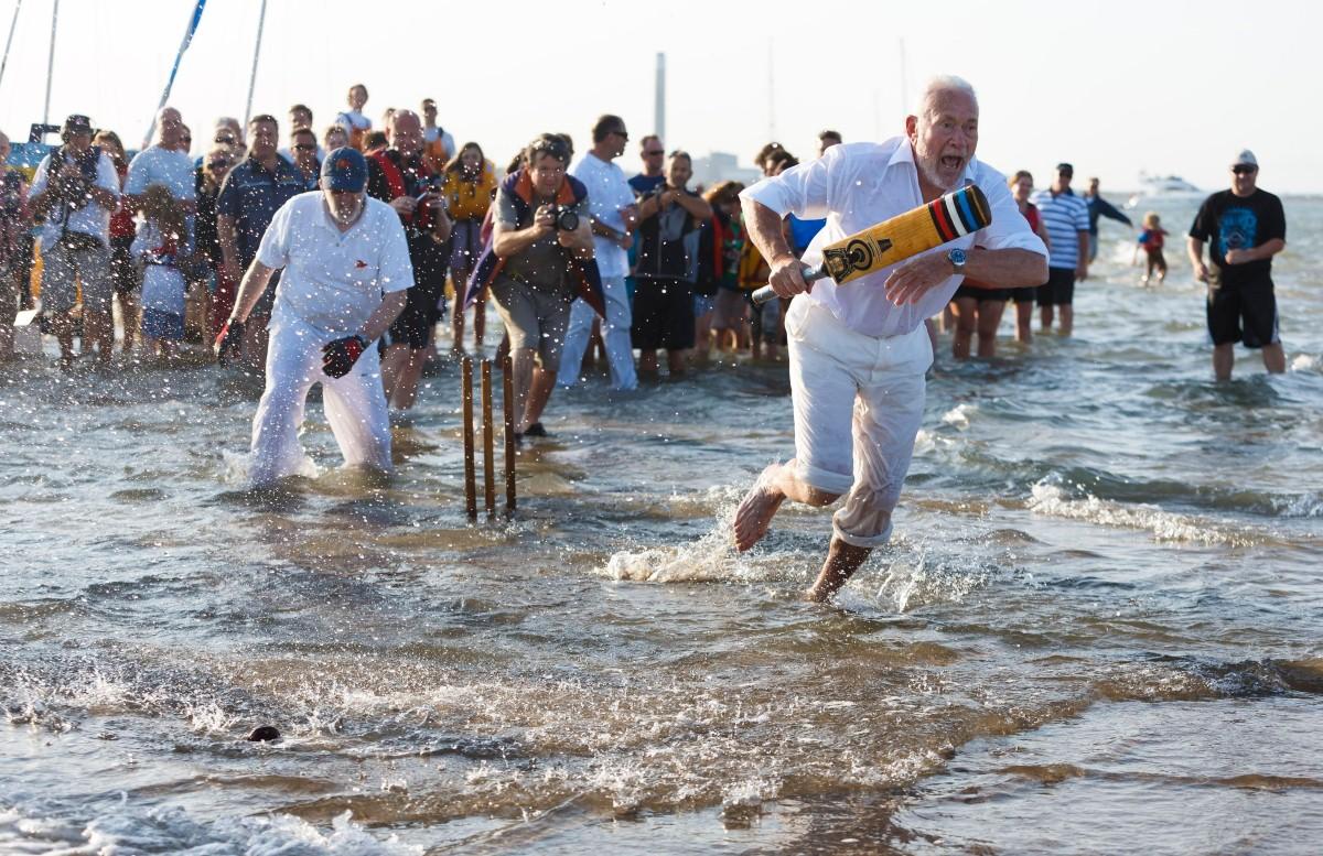 The Year in Pictures - 2013 - Sir Robin Knox-Johnston at the crease during the Bramble Bank cricket match in the Solent. August 22, 2013.