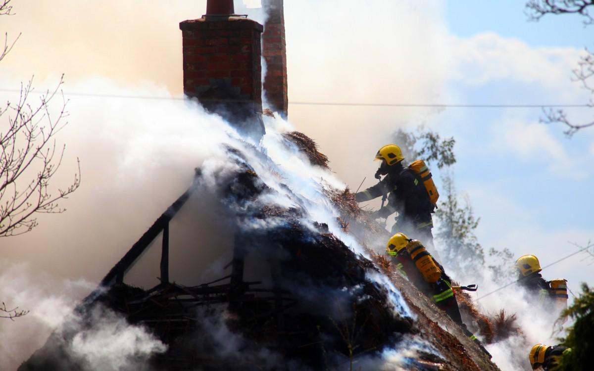 The Year in Pictures - 2013 - Firefighters tackle a blaze at a thatched cottage in Durley. April 19, 2013.