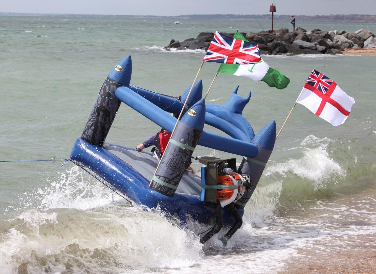 The Year in Pictures - 2013 - A group of military officers attempted to cross the Solent on a bouncy castle. August 10, 2013.