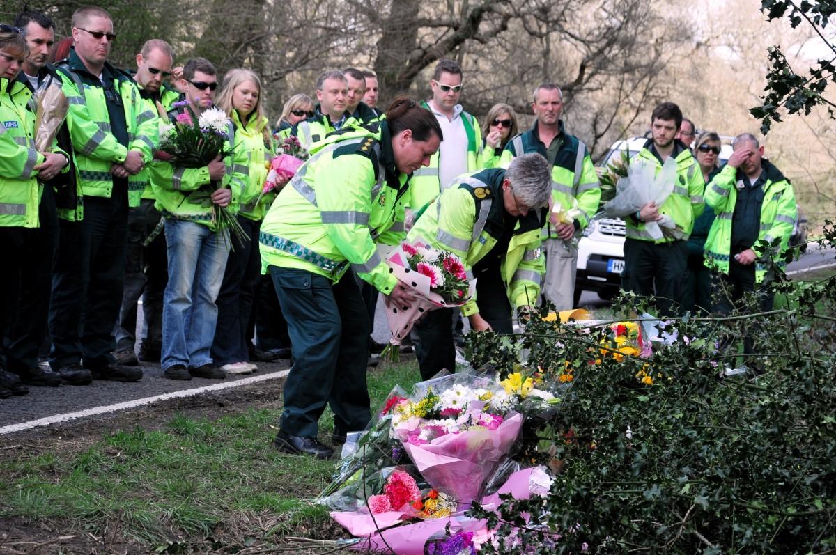 The Year in Pictures - 2013 - Ambulance staff pay tribute to their colleague Gill Randall who died in an ambulance accident on the A337. April 29, 2013.