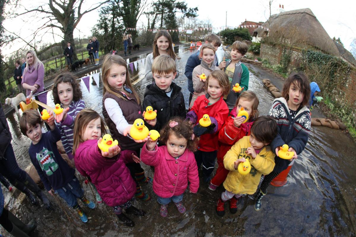 Duck race in Bramdean on the floodwater of the A272.