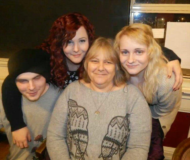 Picture of me and my brother and sister with my mum, my Sarah Pack, with the red hair, my brothers name is Cody Dewey, sister is Topaz Dewey and my mother's name is Mandy Dewey