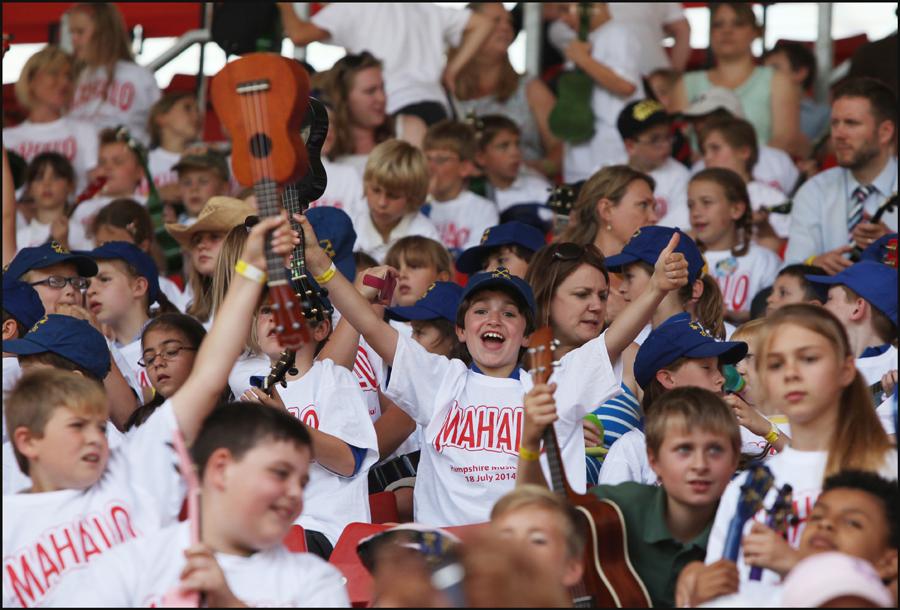 Young musicians gather at St Mary's Stadium with TV presenter Justin Fletcher to attempt to break the record for a ukulele playing ensemble