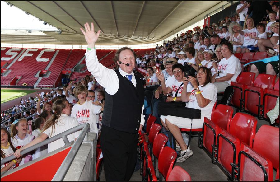 Young musicians gather at St Mary's Stadium with TV presenter Justin Fletcher to attempt to break the record for a ukulele playing ensemble