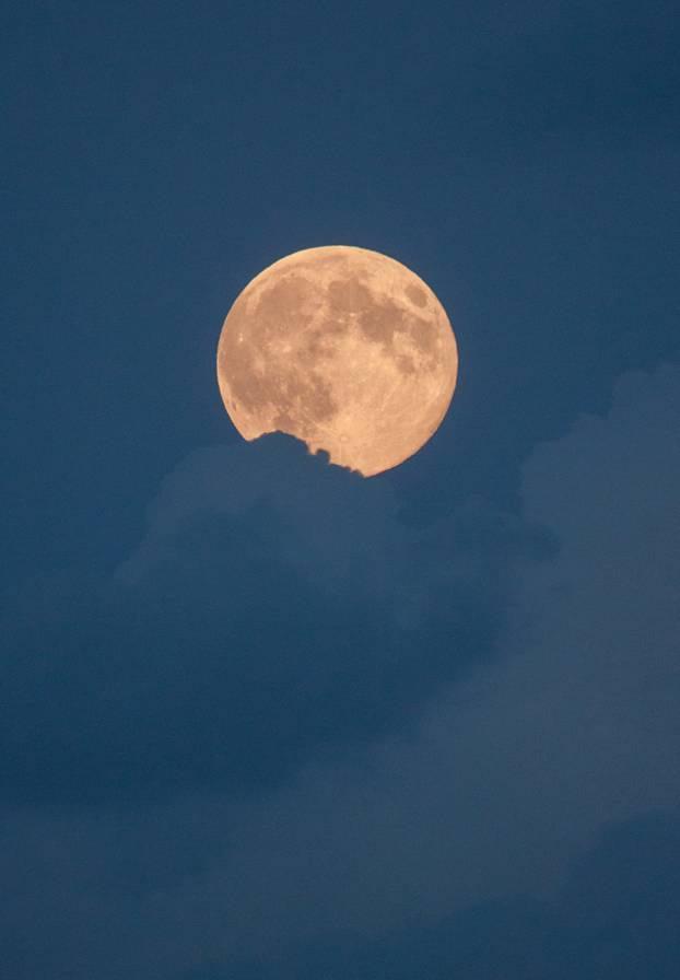 Photo of the moon rising over the Isle of Wight by Brian Dempsey