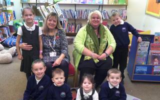 Deb Summers, Head of Infant School, and Amanda Mullett, Executive Headteacher, with some of their pupils