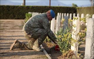 Members of 17 Port and Maritime Regiment pay triobute to fallen comrades