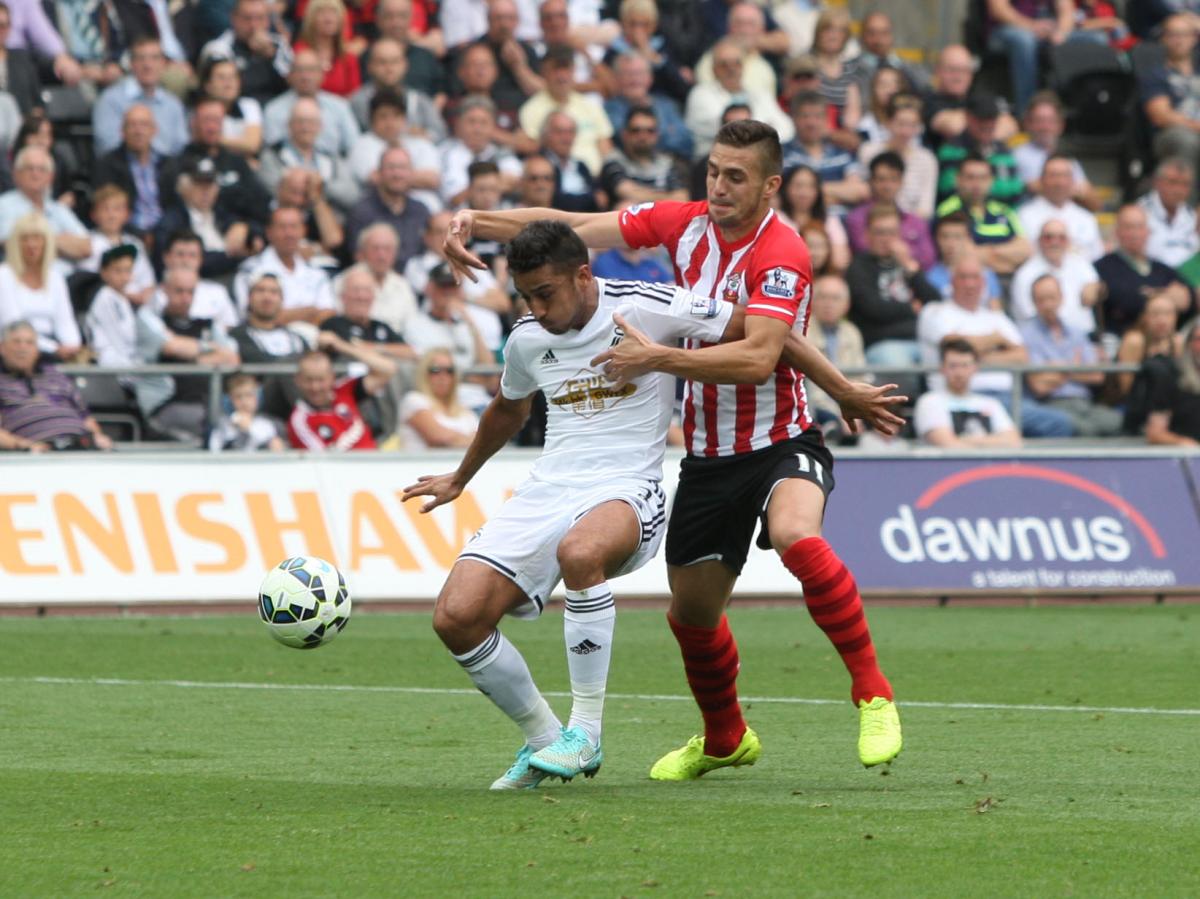 Pictures from the Barclay's Premier League match between Swansea City and Saints. The unauthorised downloading, editing, copying, or distribution of this image is strictly prohibited.