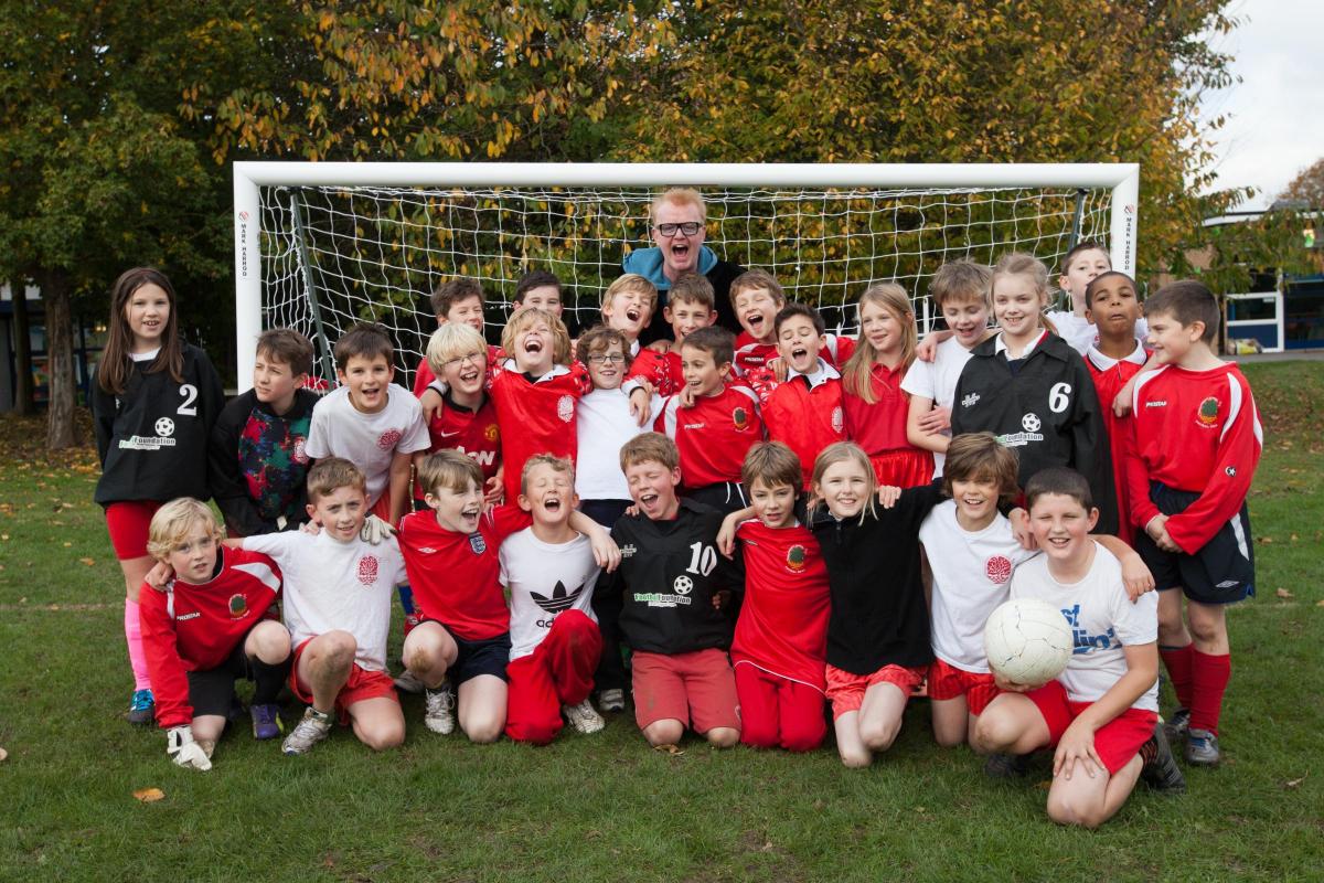 Chris Evans was at Weeke Primary to present the children with goalposts. Whilst there, he invited all 1,300 to the Children in Need festival Carfest.