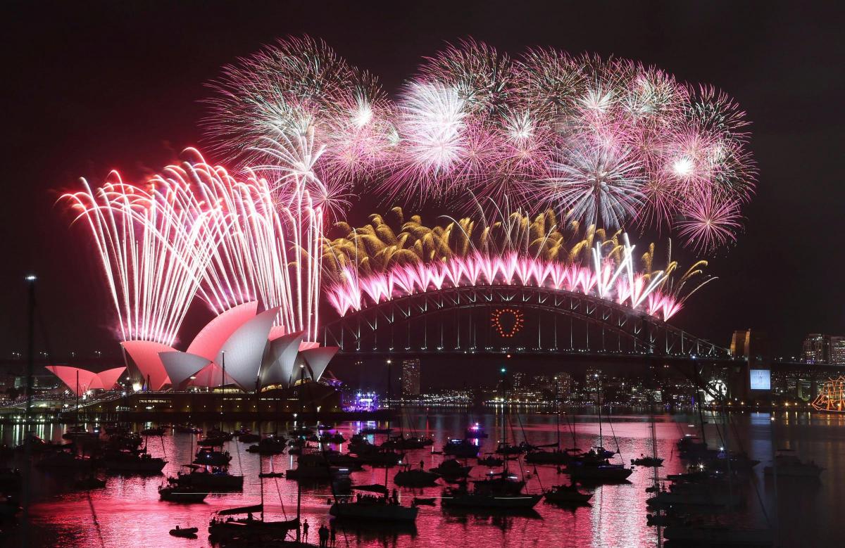 Fireworks explode over the Opera House and the Harbour Bridge during New Year’s Eve celebrations in Sydney, Australia. Picture of the day for January 1, 2015.