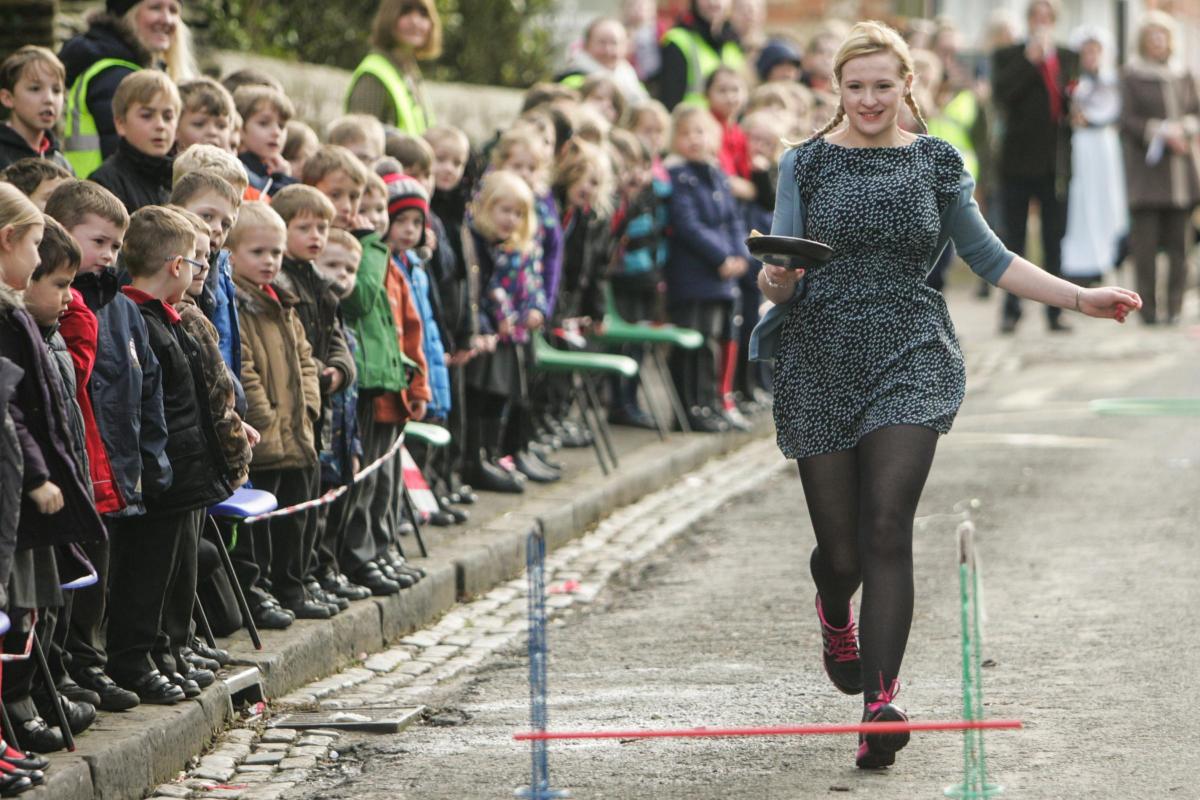 Pictures from the annual pancake race on Beaulieu High Street.