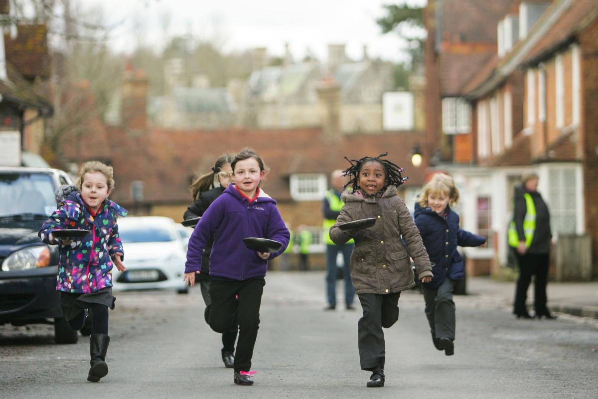 Pictures from the annual pancake race on Beaulieu High Street.