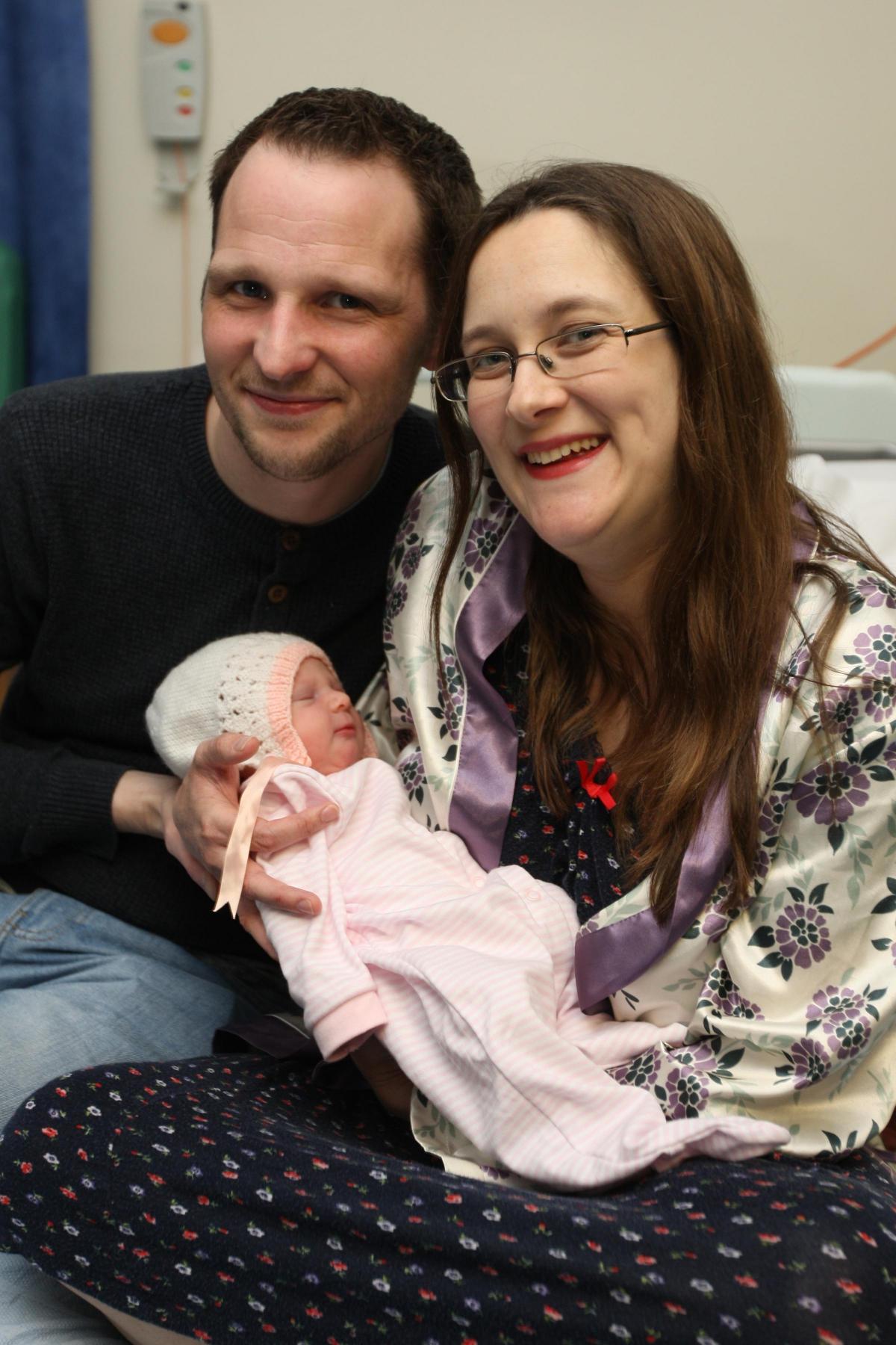 Carrie Middleton and fiancee Paul Kinnaird with baby Alice Elizabeth