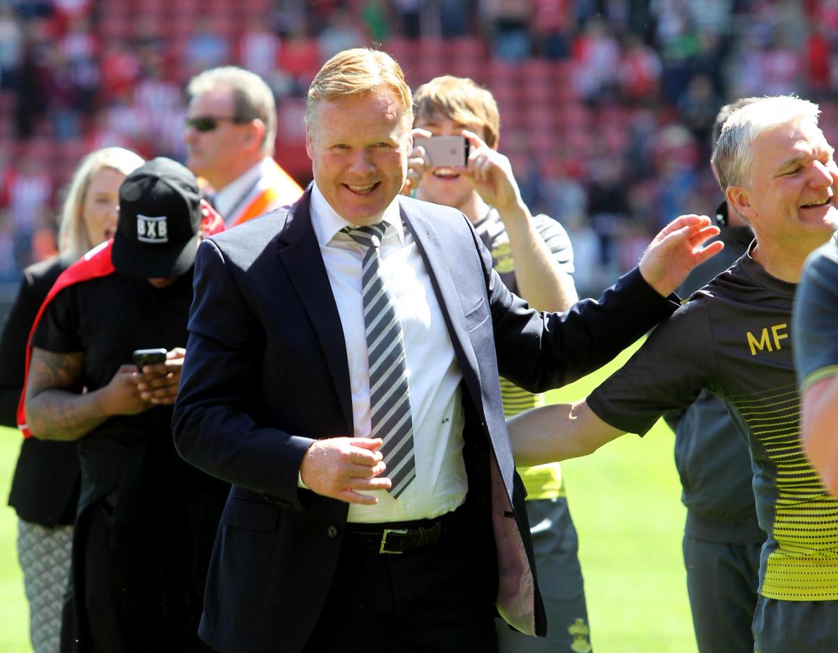 Koeman celebrates after a 6-1 win over Aston Villa in the final home match of the season.