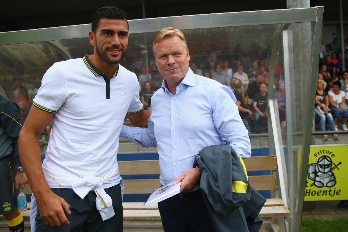 Koeman poses with new signing Graziano Pelle, as Saints' pre-season trip begins in Holland.