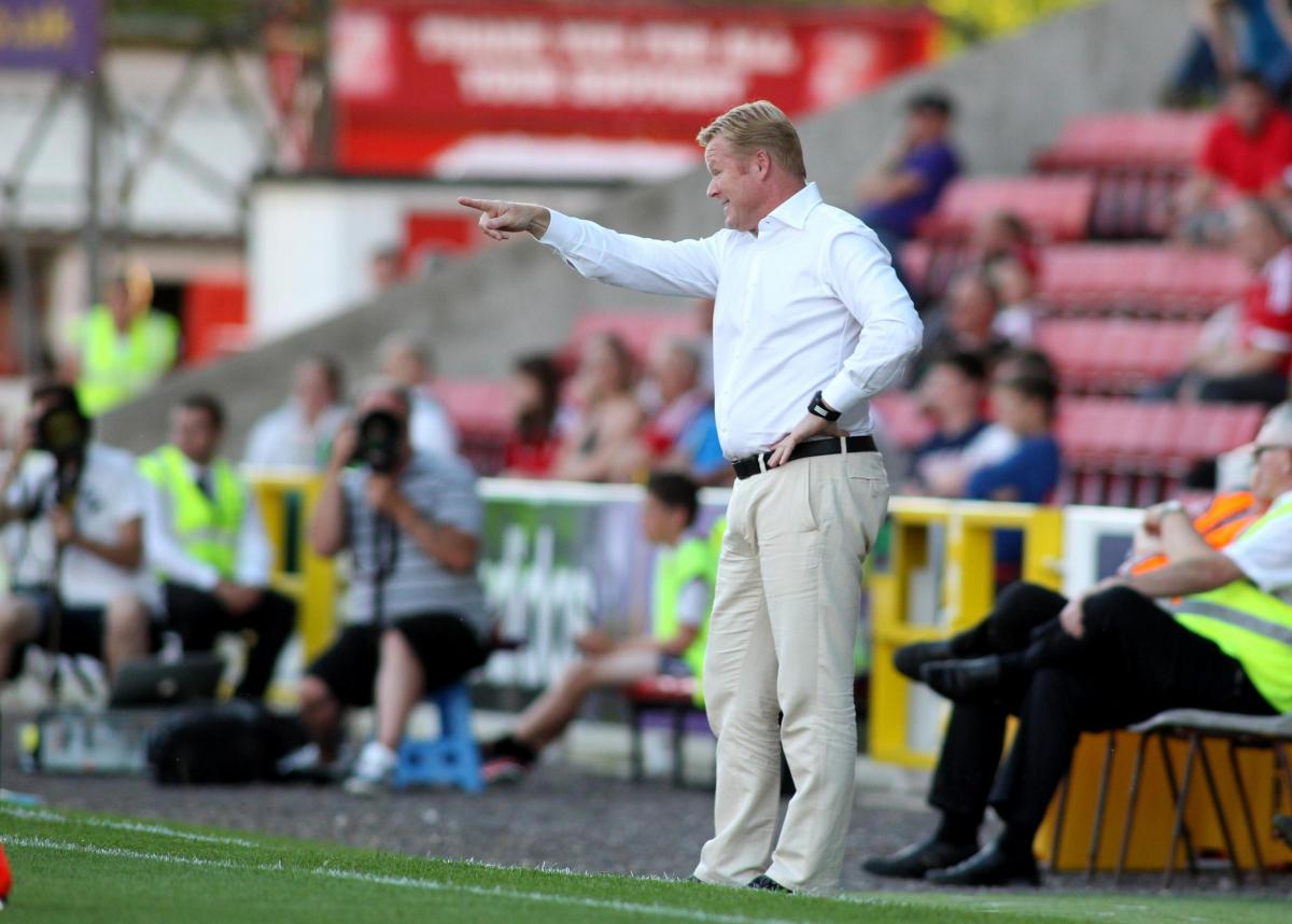Pre-season continues with a trip to Swindon, where Koeman issues directions to his team.