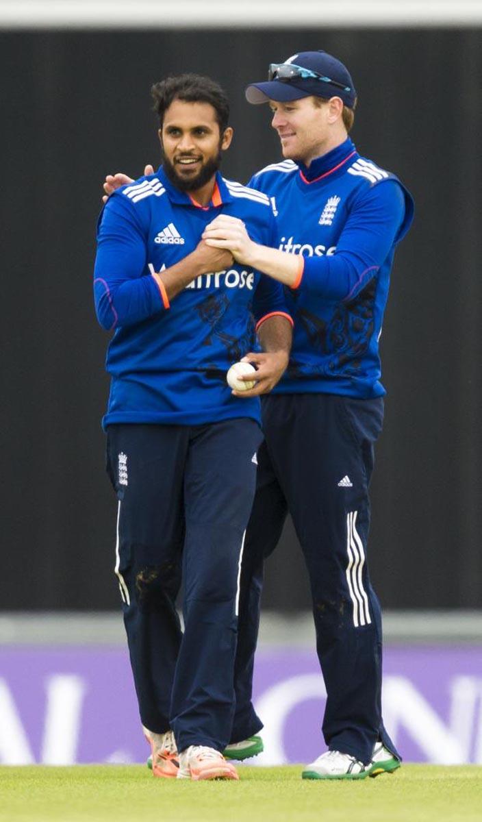 Adil Rashid after his catch sees Joe Burns out for 44