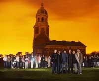 SUNSET VIGIL: Mourners gather at Royal Victoria Country Park to pay tribute to Jordan Wickington, inset. Echo picture by Andrew McCargow