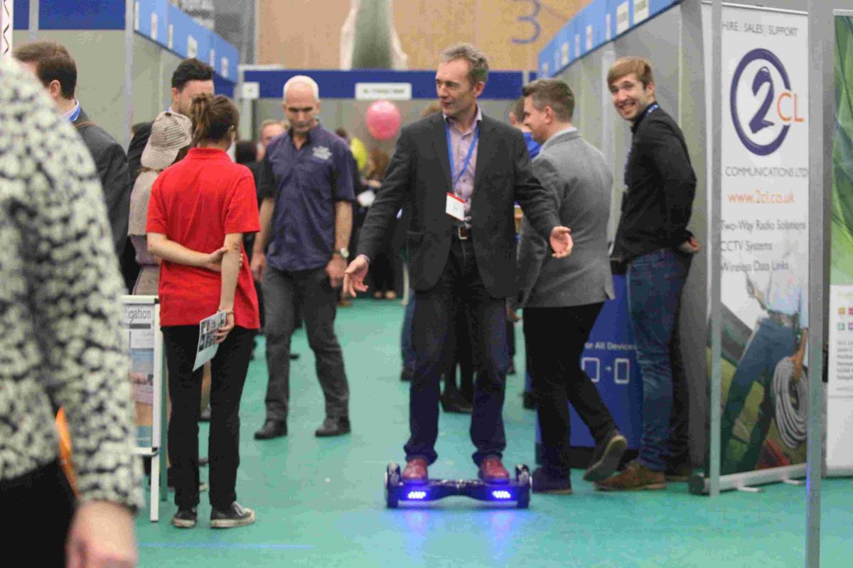 Mike Nash of Front Page Advantage on a hoverboard.