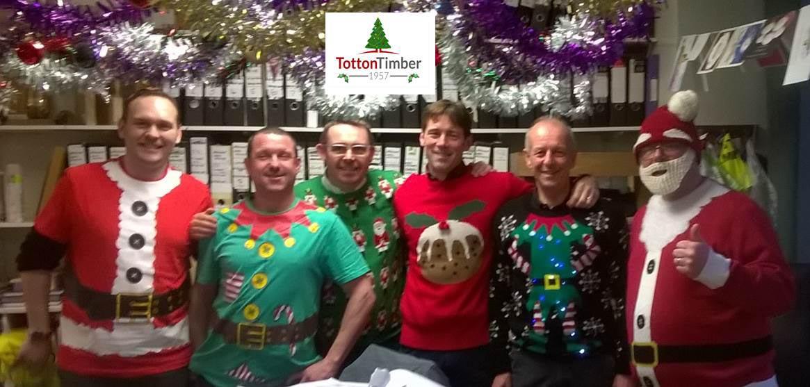 Office staff at Totton Timber in their jumpers