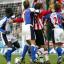 FLASHPOINT: Andy Cole, left, clenches his fist as trouble erupts at St Mary's. Echo photo by Stuart Martin.