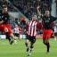 NO WAY THROUGH: Carlos Bocanegra clears, left, as Kevin Phillips moves in to threaten for Saints. Echo picture by Gordon Agg-Jones