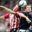 BATTLE: James Beattie and Andy O'Brien contest a high ball. Echo picture by: Paul Collins.
