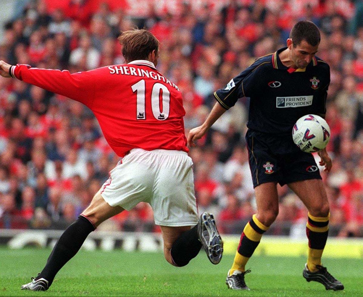 Benali against another United player, Teddy Sheringham