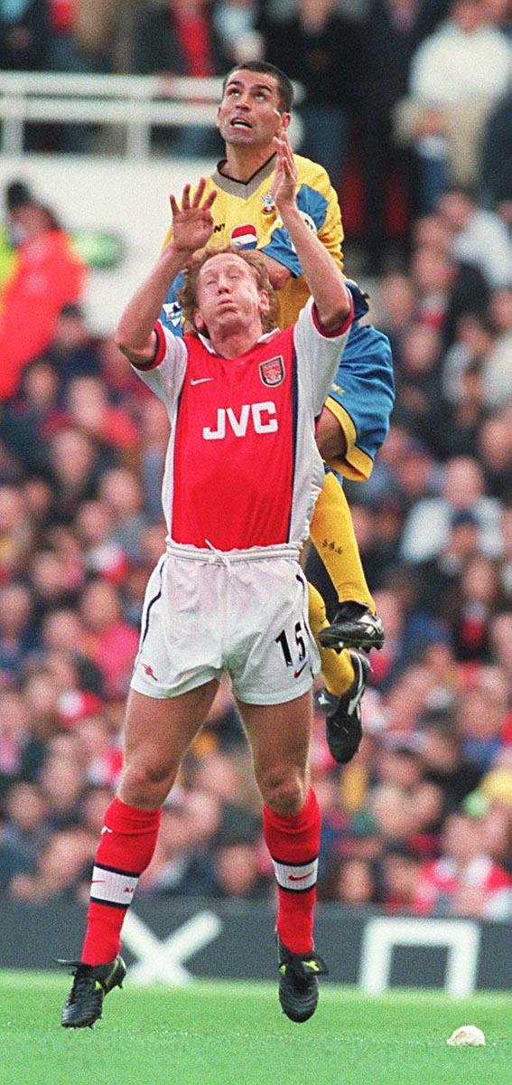 Benali tussles with Arsenal's Ray Parlour