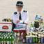 SHOCKING: Police officer Kerry Loveless, pictured at Shirley police station with bottles and cans of booze taken off kids drinking in the streets.
