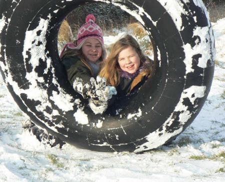 Snow covers Hampshire - Isabella and Fenella at Butser Hill