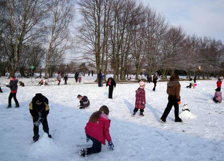 Snow covers Hampshire Children play in the snow at Mansel Park Primary School