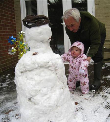 Snow covers Hampshire - Lily Samantha Corbin with grandad