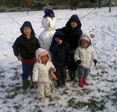 Snow covers Hampshire - Snowman and kids taken by Tracy Burns