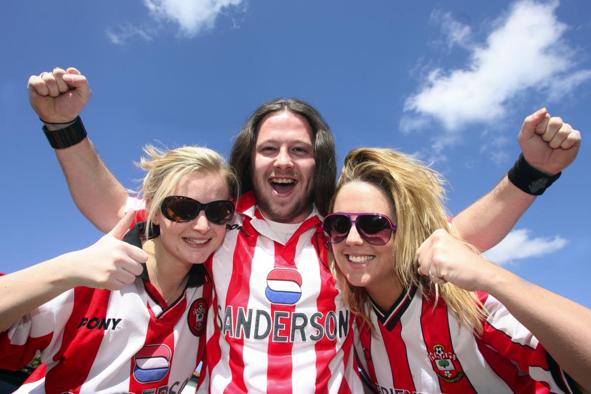 Danielle Townsend, Lewis Felgate and Danielle Mclaren show their support of Southampton FC on the way to the game against Charlton.