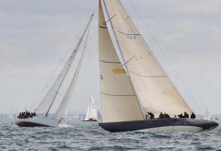 The 12 metre yacht Italia (right) and the British boat Nisidia cross during racing in class 1.