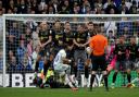 Southampton players throw themselves behind a Leeds free-kick