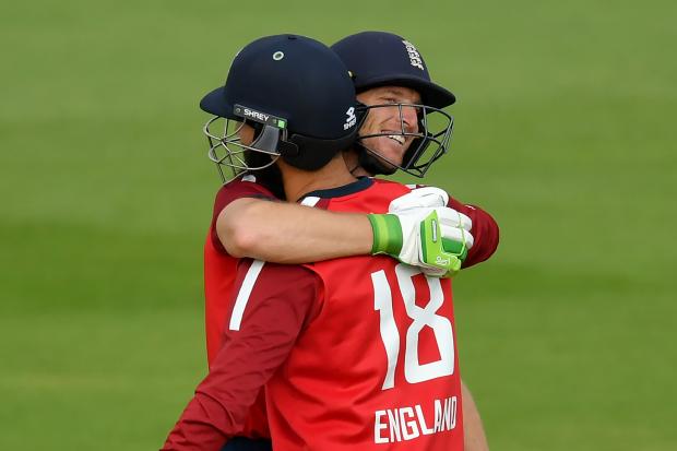 England's Jos Buttler (left) and Moeen Ali embrace following victory during the second Vitality IT20 match at the Ageas Bowl, Southampton. PA Photo. Picture date: Sunday September 6, 2020. See PA story CRICKET England. Photo credit should read: Dan