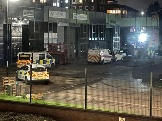 Daily Echo: Multiple police vehicles were seen in the City Commerce Centre industrial park last night (21/11/20) as police searched for a man who pulled out a gun in a Southampton takeaway.