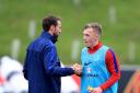 England caretaker manager Gareth Southgate (left) with James Ward-Prowse (right) during a training session at St George's Park, Burton..