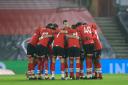 Southampton players gather in a huddle before the Emirates FA Cup third round match at St Marys Stadium, Southampton. Picture date: Tuesday January 19, 2021. PA Photo. See PA story SOCCER Southampton. Photo credit should read: Adam Davy/PA Wire.